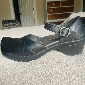 black heeled clogs with strap